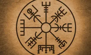 Runiczny kompas Vegvísir na brązowym tle.