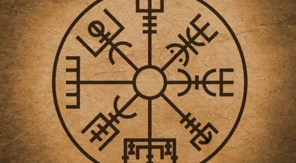 Runiczny kompas Vegvísir na brązowym tle.